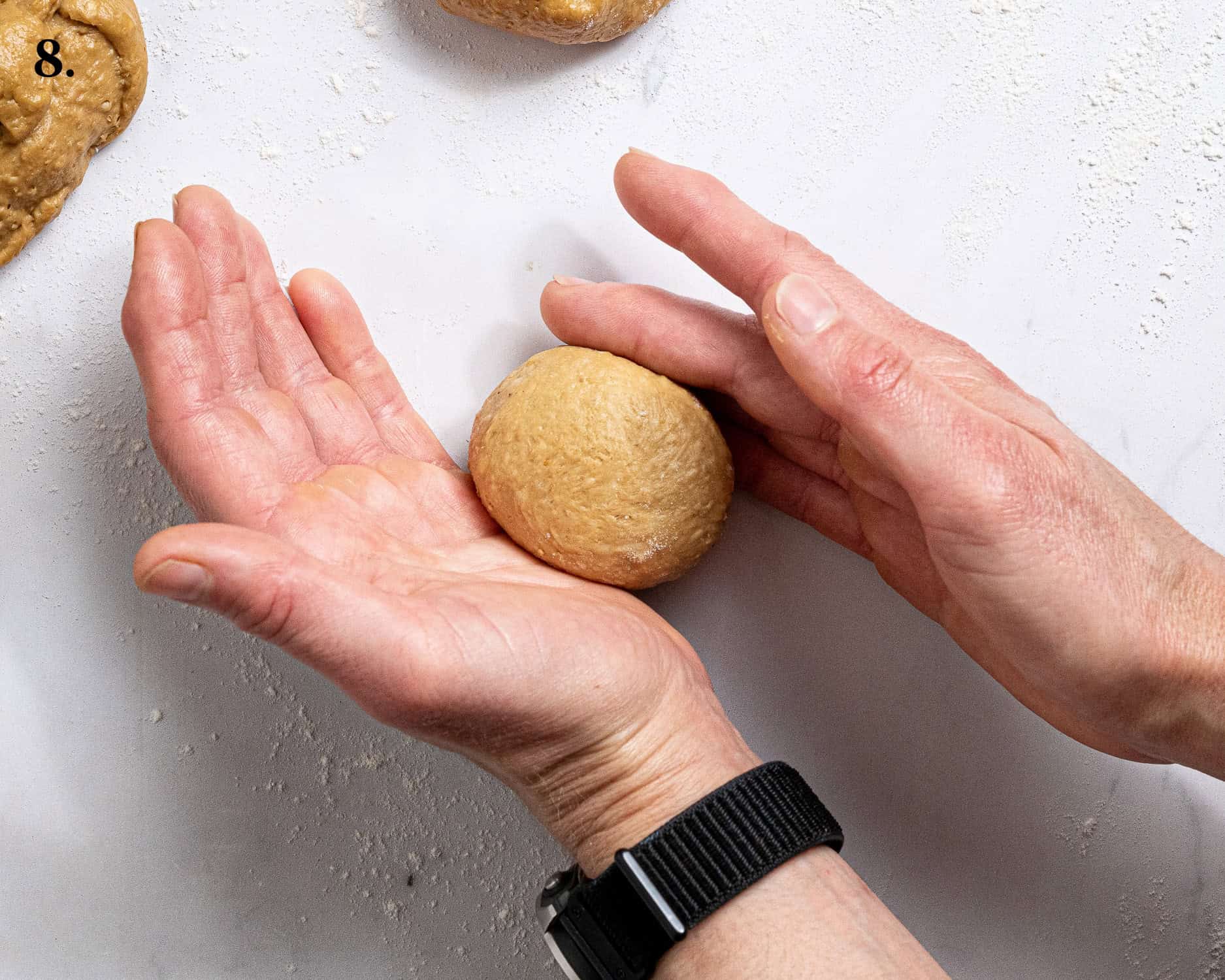 Step 8, rolling the dough ball.