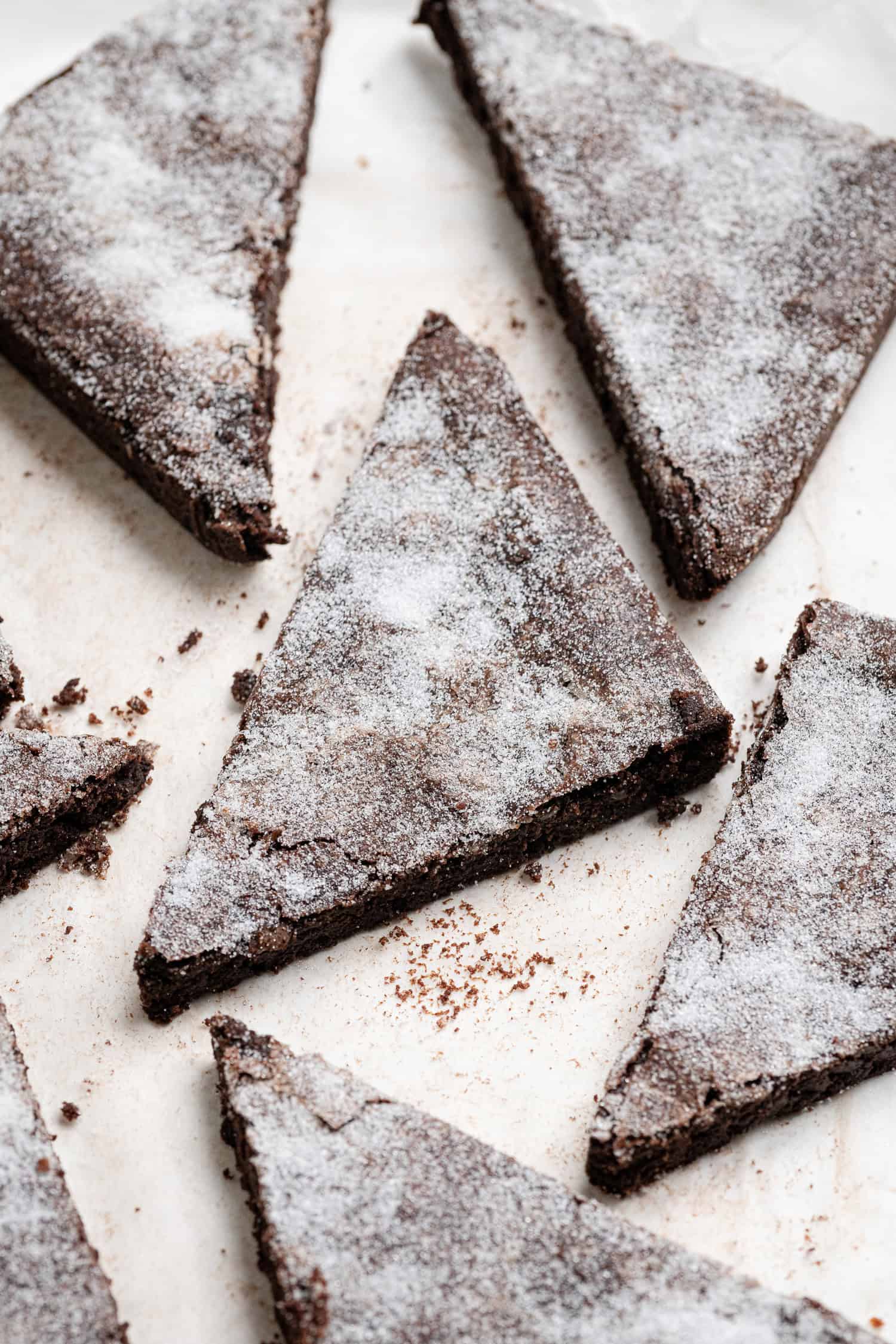 Close up shot of a triangle of vegan chocolate concrete.