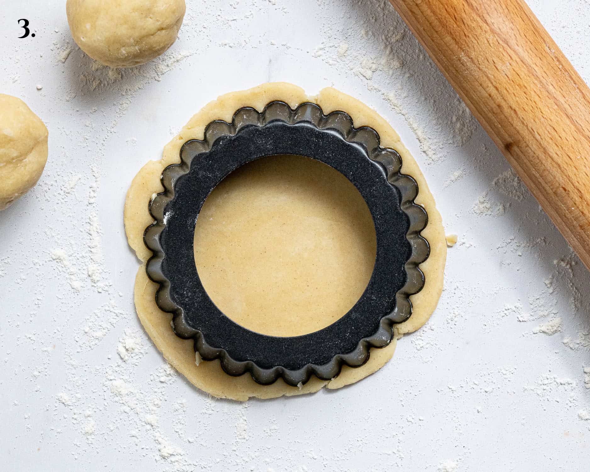 Step 3, cutting out the pastry rounds.