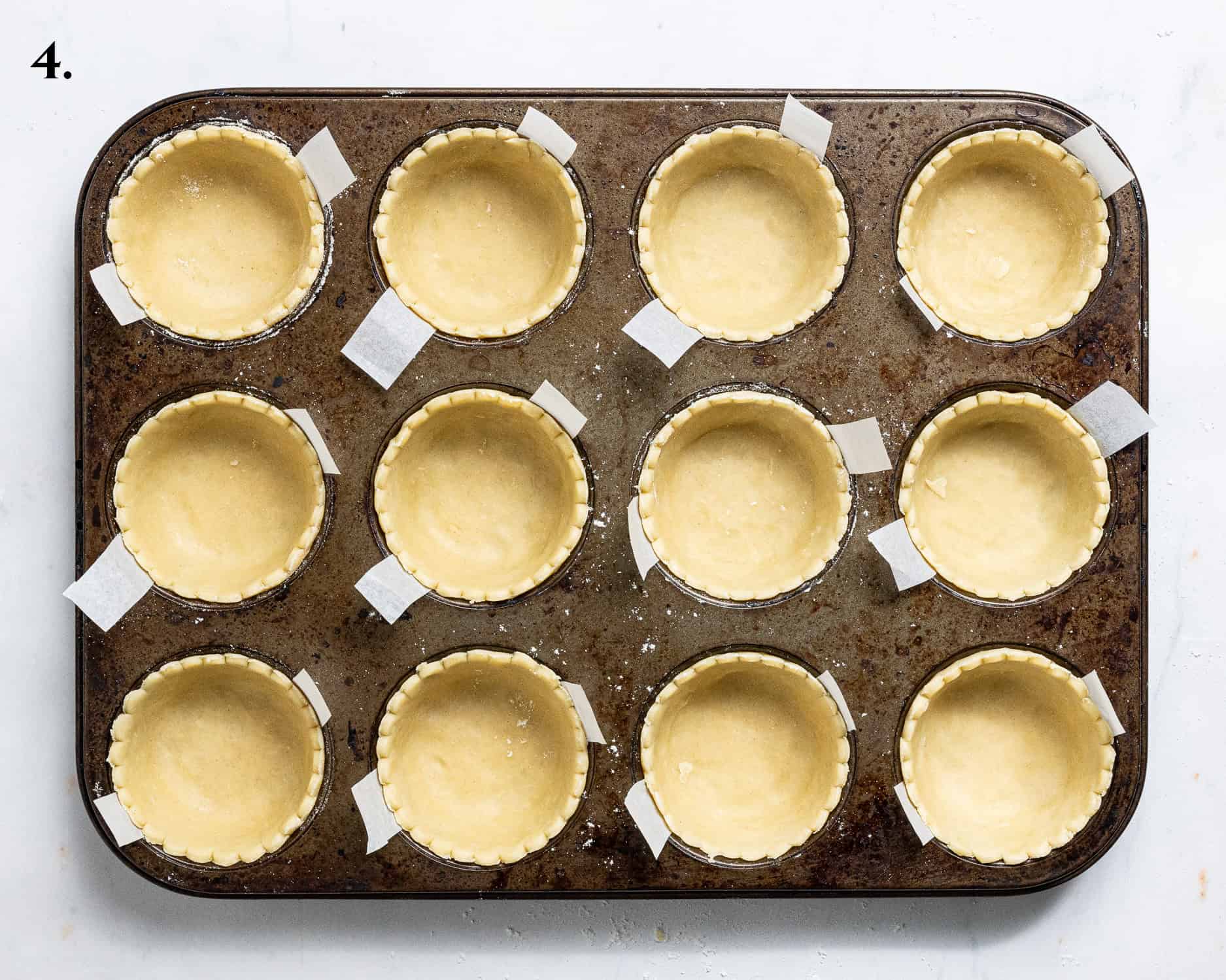 Step 4, the pastry rounds in the muffin tin.