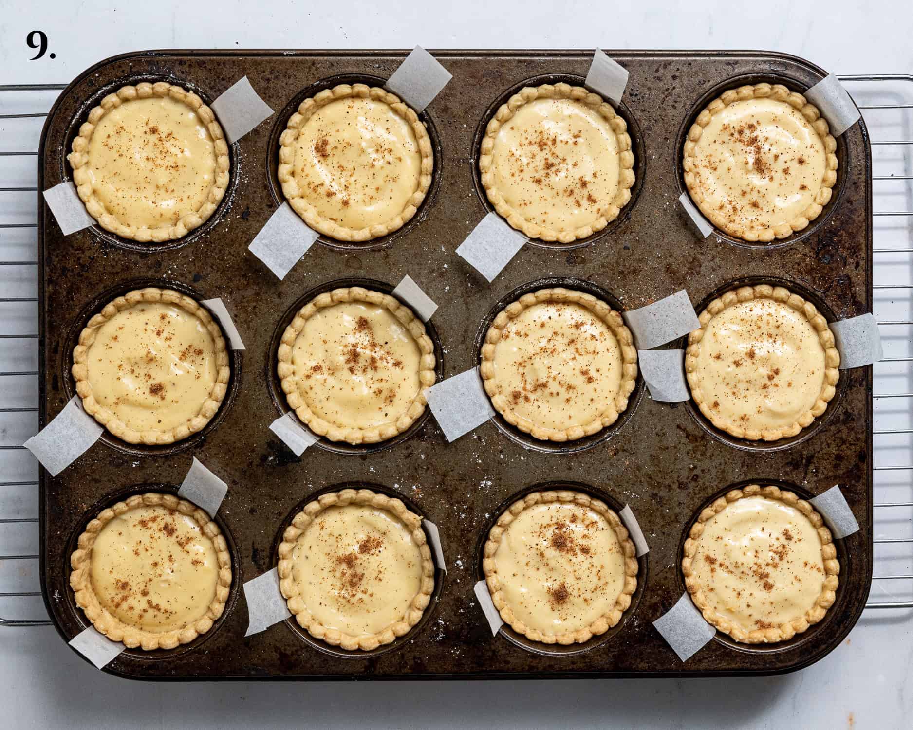Step 9, the assembled custard tarts before baking.