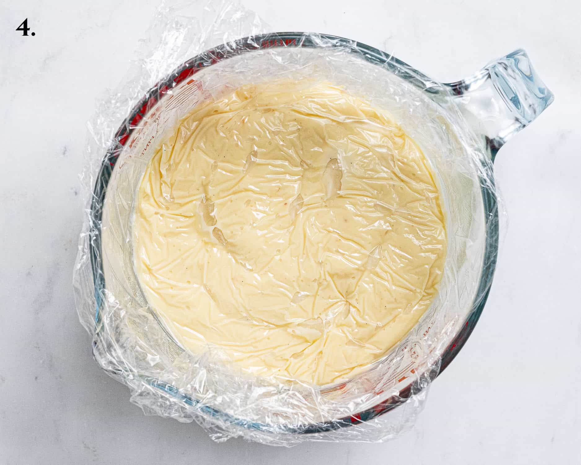 Step 4, the custard in a jug covered with clingfilm.