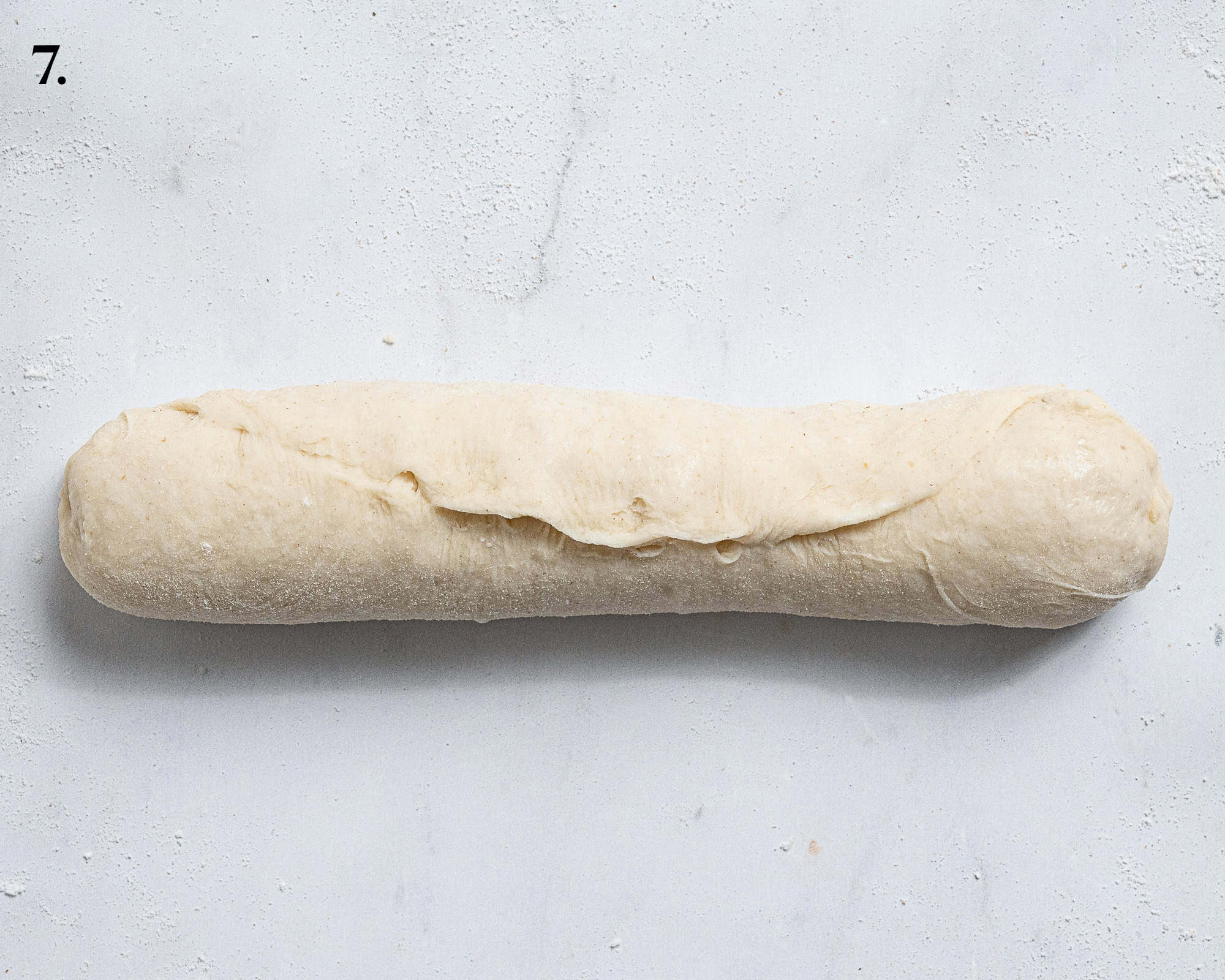 Step 7, the sealed log of dough.