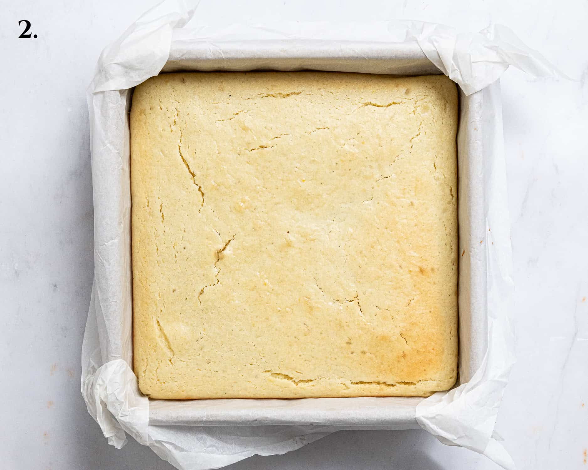 Step 2, the baked cake in the tin.