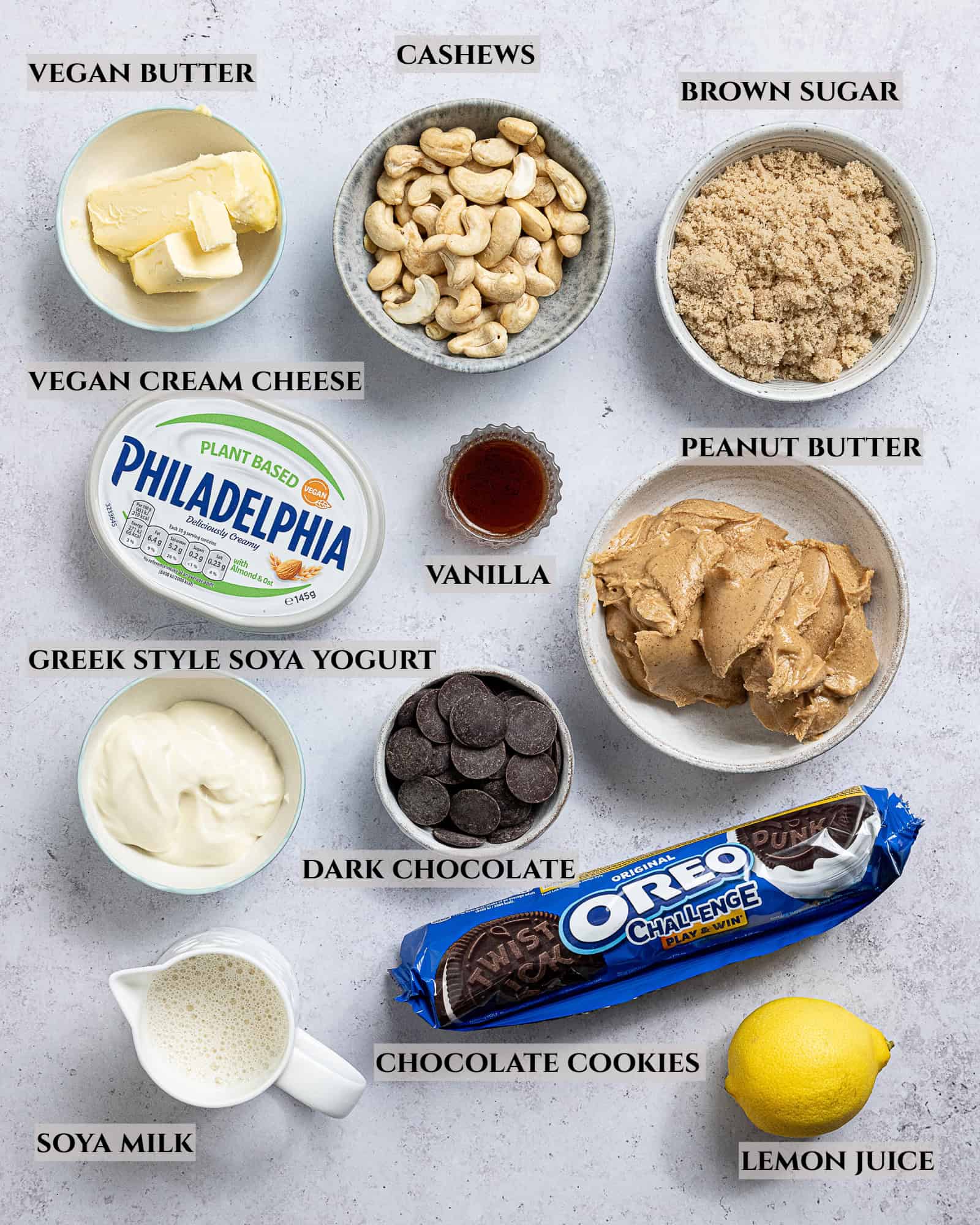 A labelled photo of the ingredients needed to make vegan no-bake peanut butter cheesecake.