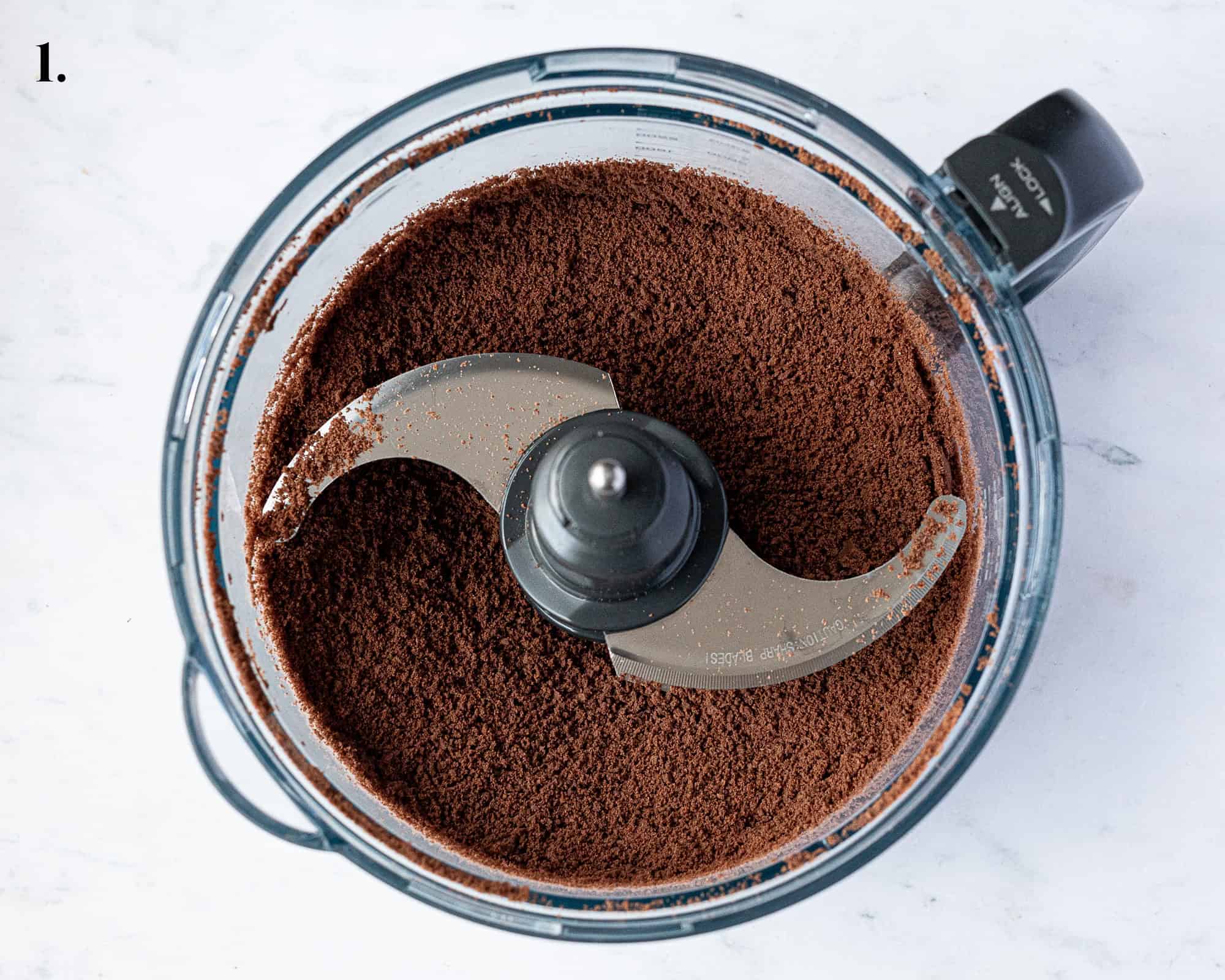Step 1, the ground up cookies in a food processor.