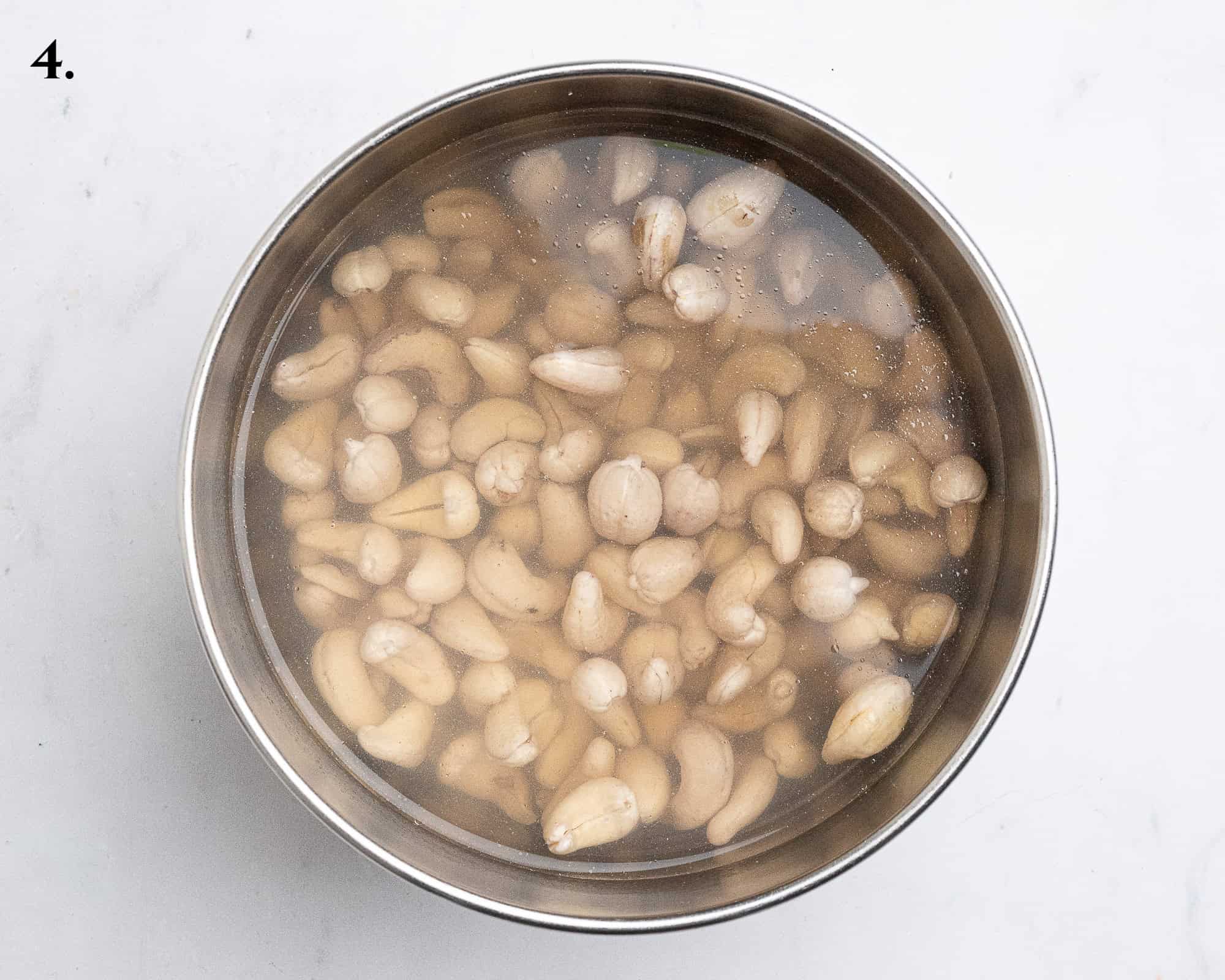Step 4, the soaking cashews in a bowl.