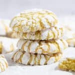 A stack of vegan lemon crinkle cookies.