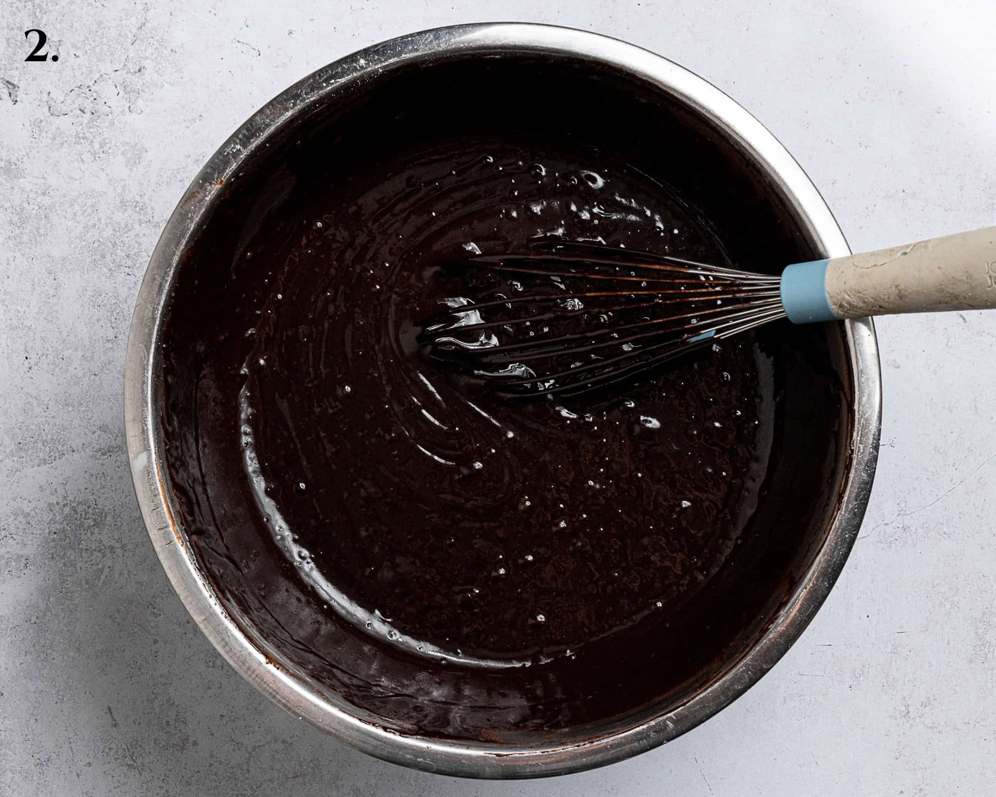 Step 2, the finished cake batter in a bowl.