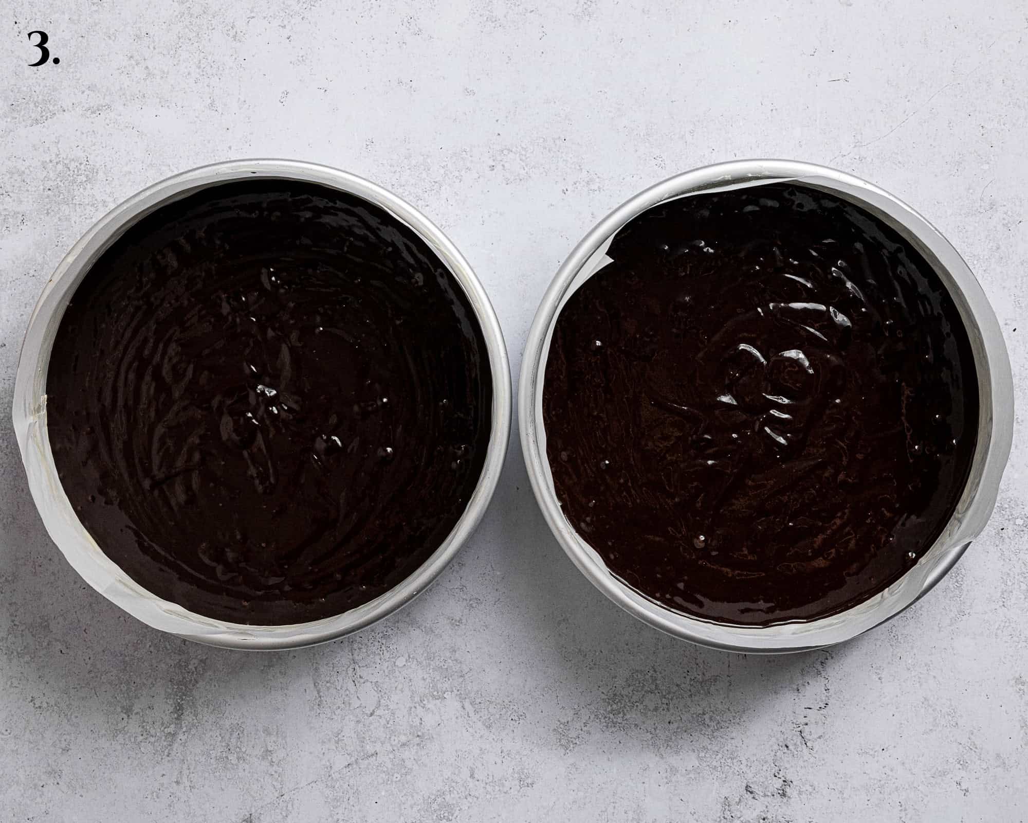 Step 3, the batter in the cake tins before baking.