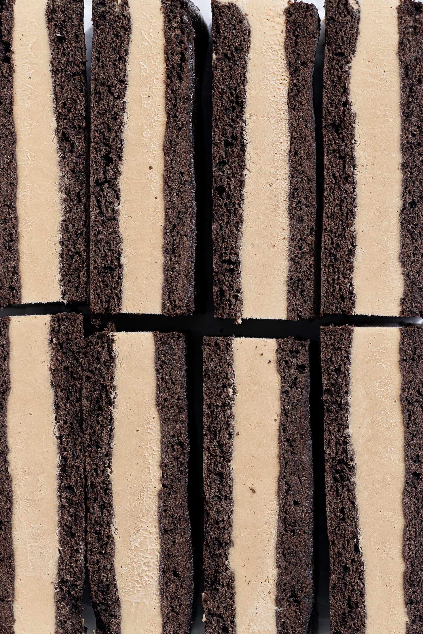 Macro shot of two rows of vegan coffee ice cream sandwiches.