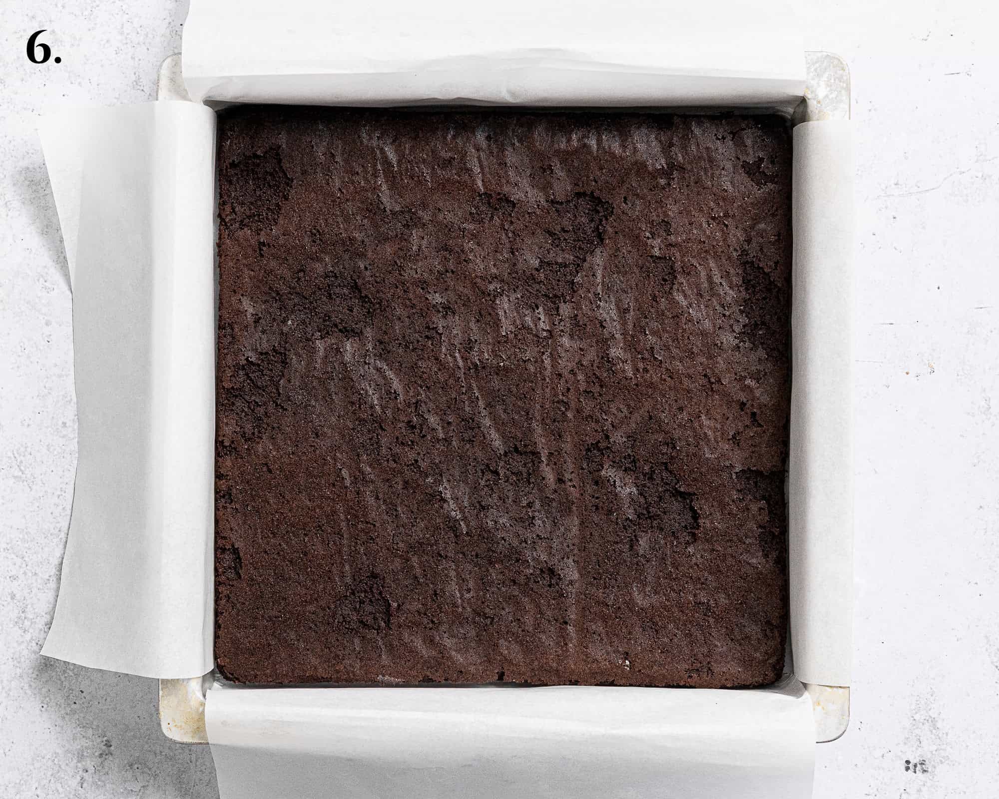 Step 6, the cookie layer upside down in the tin.