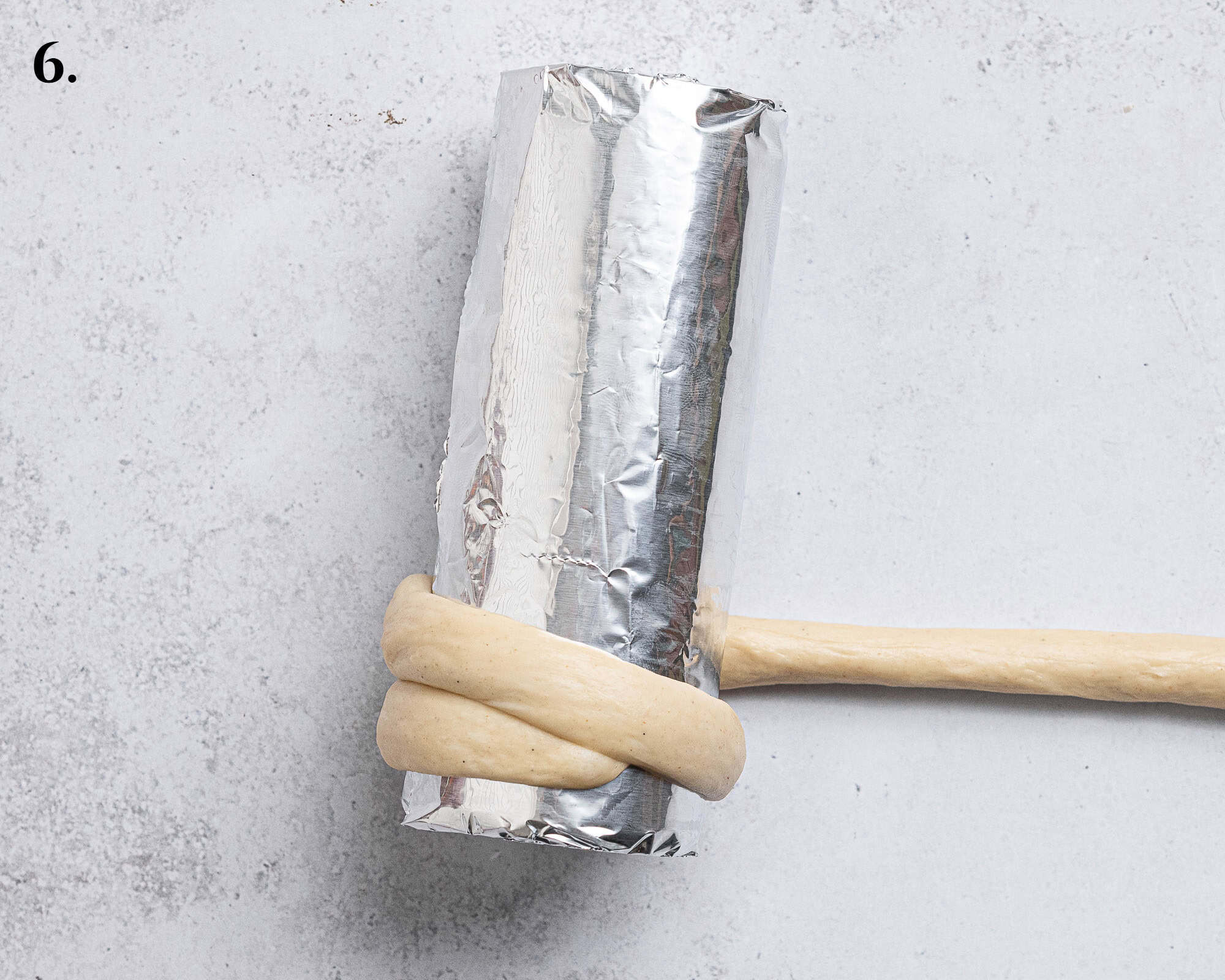 Step 6, coiling a strip of dough around a can.