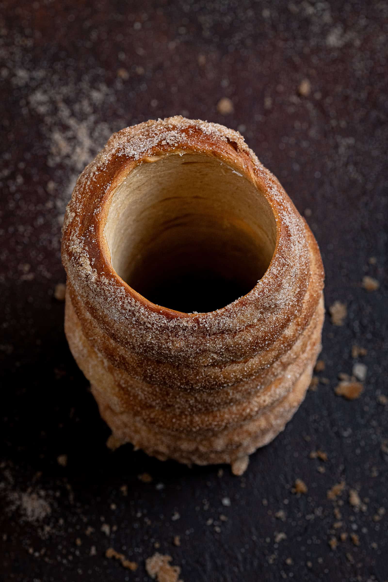 Close up shot of the top of a vegan chimney cake.