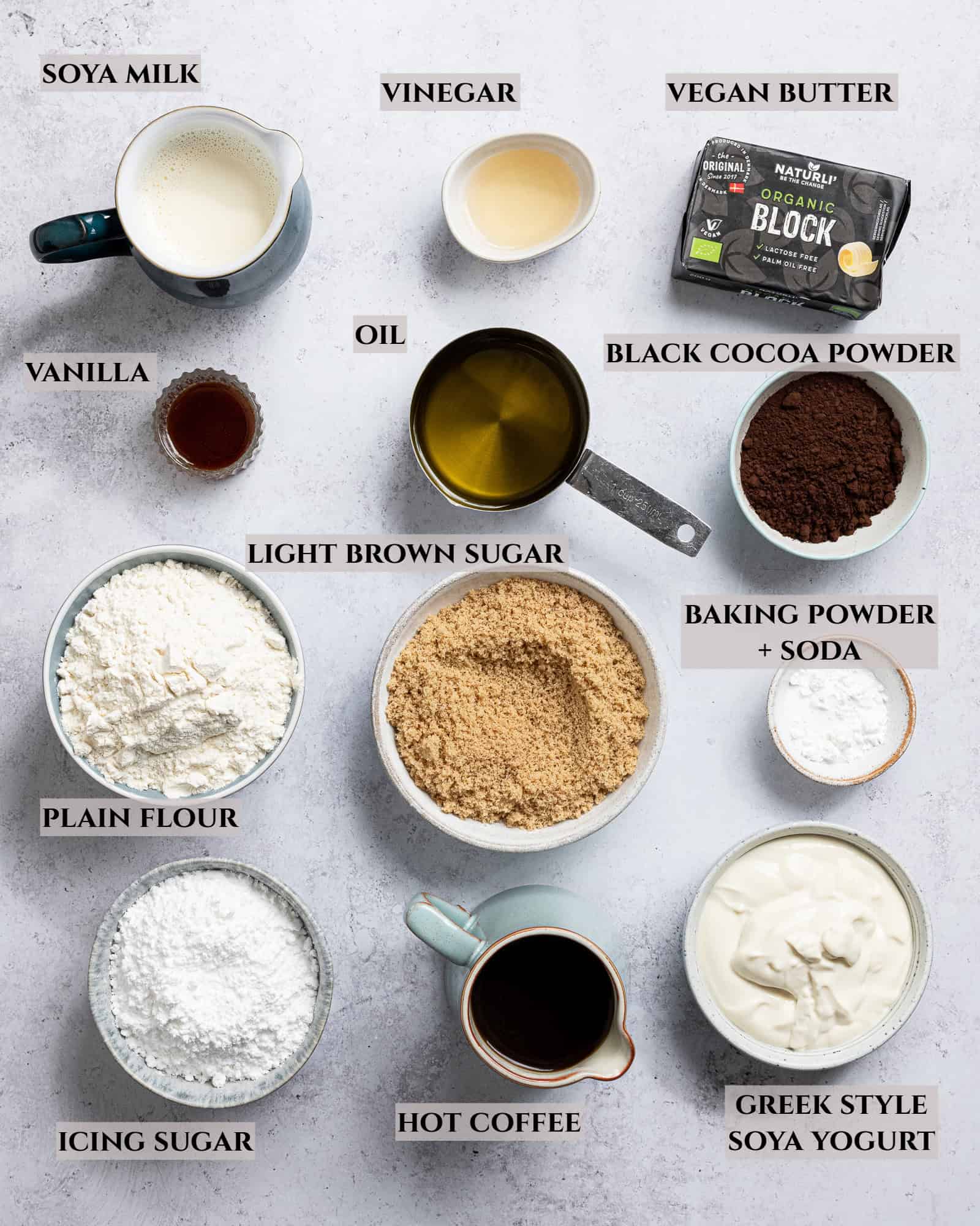 A labelled photo of the ingredients needed to make vegan black velvet sheet cake.